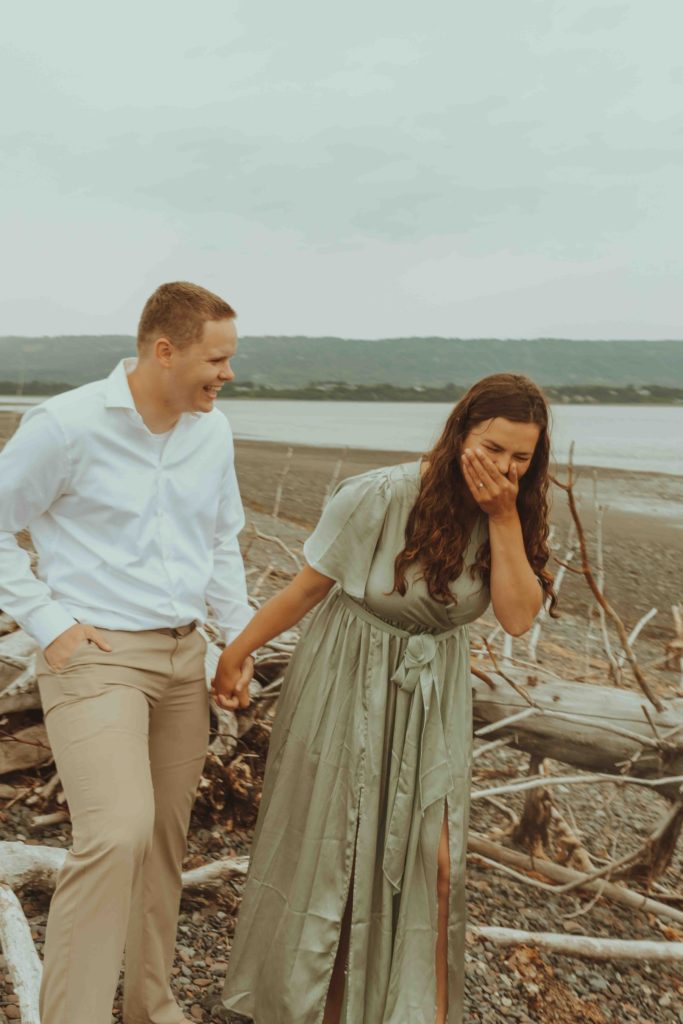 Candid Couple Laughing Hard During Engagement Photo Sessions