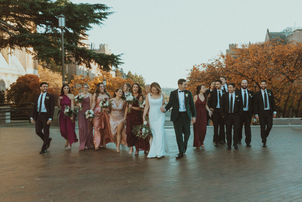 Wedding Party Walks Through University of Washington in the Fall