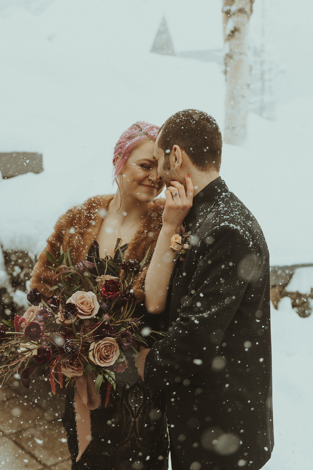 bride and groom looking at each other