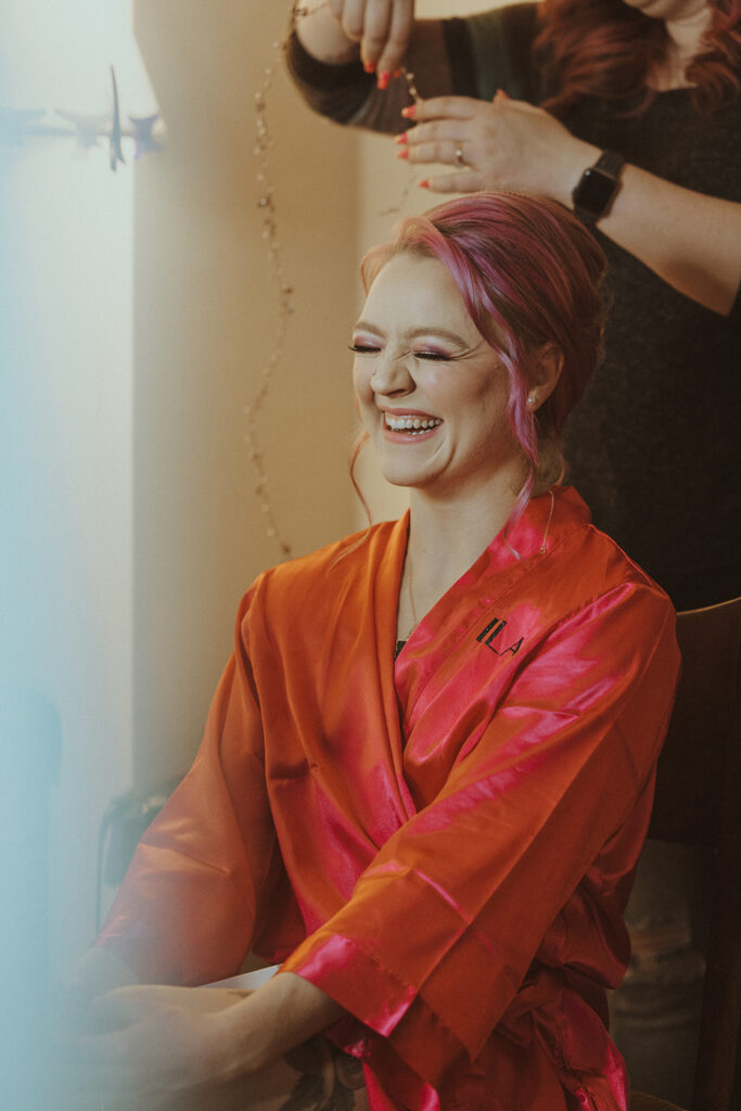 bride getting her makeup done