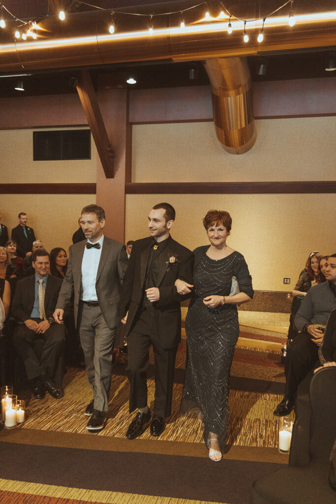 groom walking down the aisle 