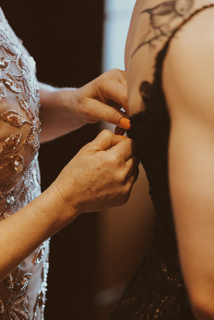 bride getting ready for her winter elopement ceremony