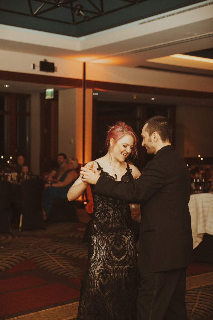 bride and groom dancing at their wedding reception