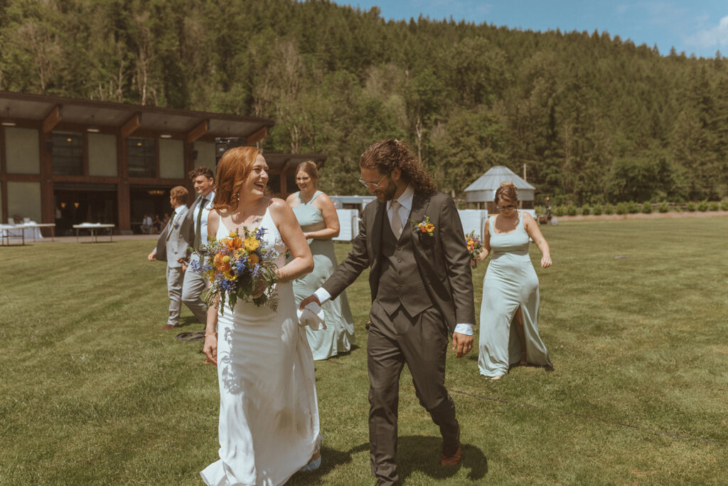 bride and groom heading to their wedding ceremony