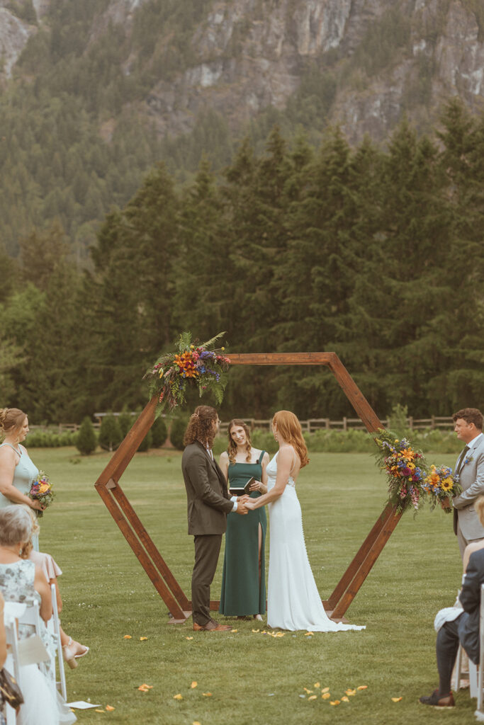 bride and groom at their Colorful Spring Wedding ceremony