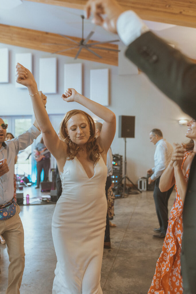 happy bride dancing