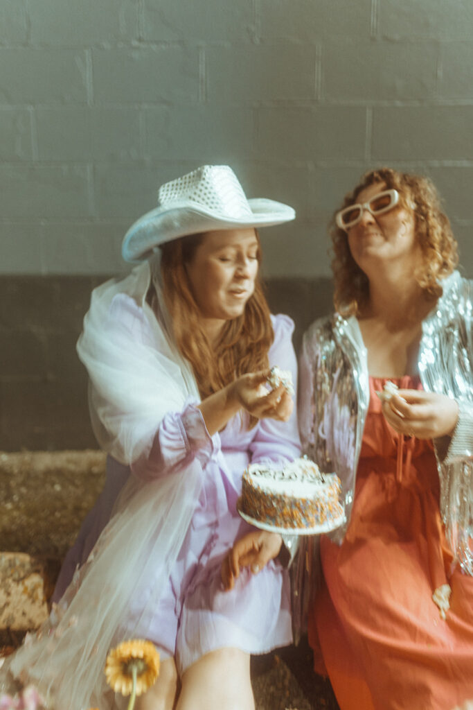 couple eating their wedding cake 