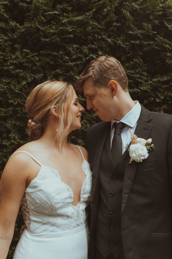 cute picture of the bride and groom smiling at each other