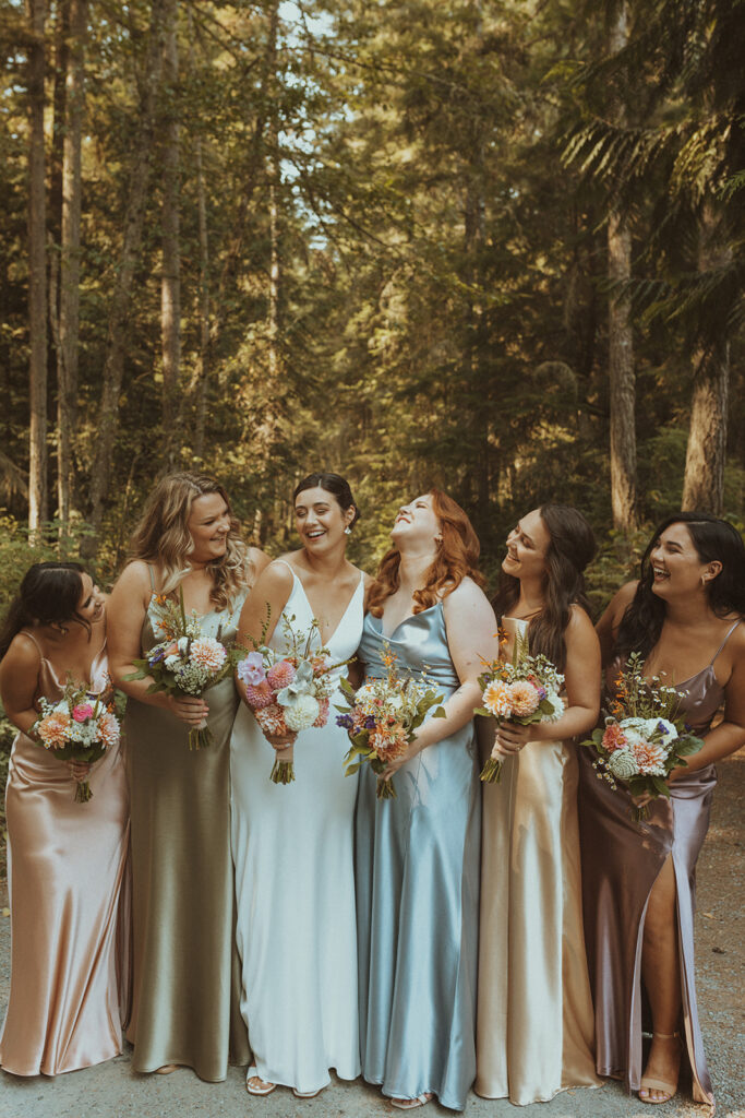 bride and her friends laughing 