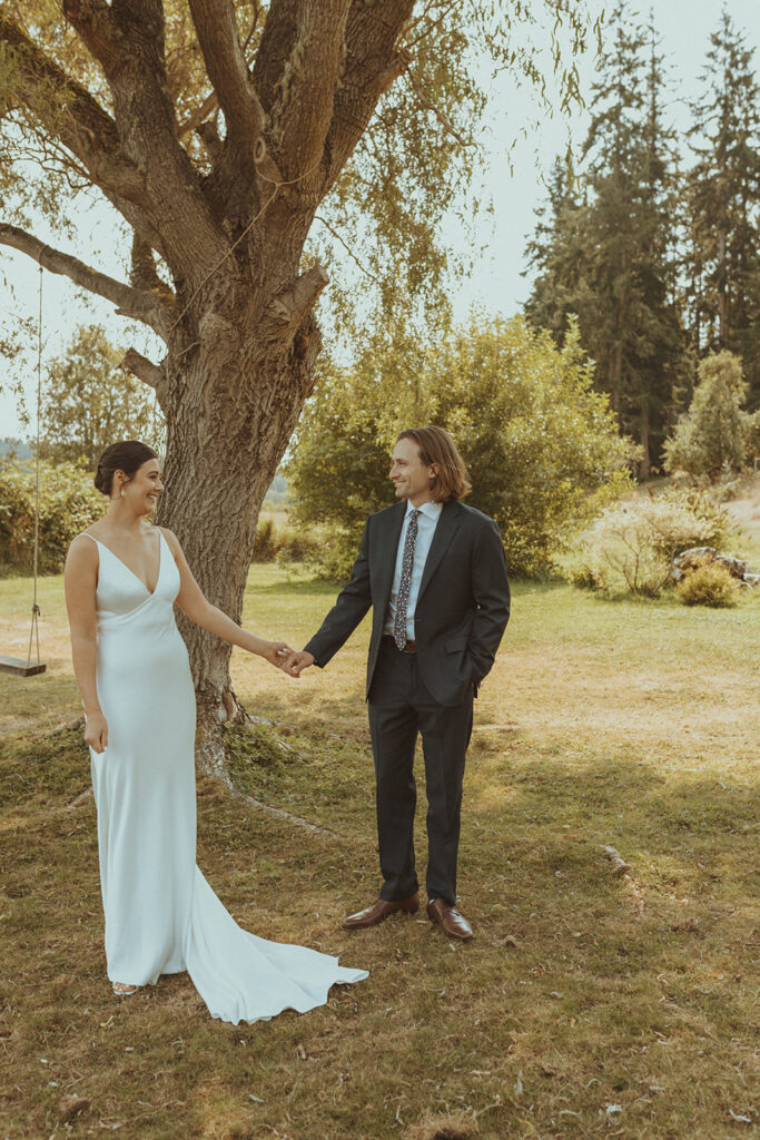 groom emotional seeing the bride in her wedding dress