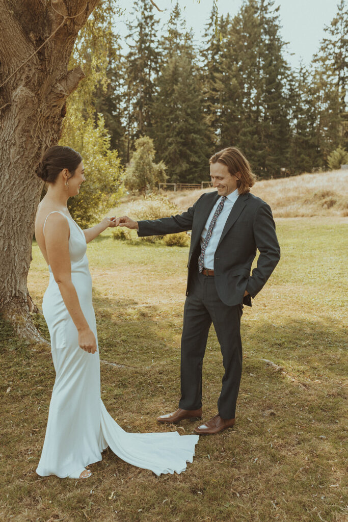 bride and groom holding hands