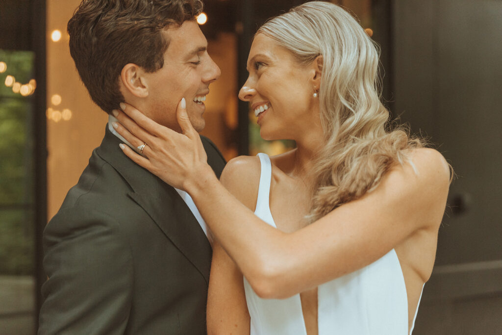 bride and groom looking at each other