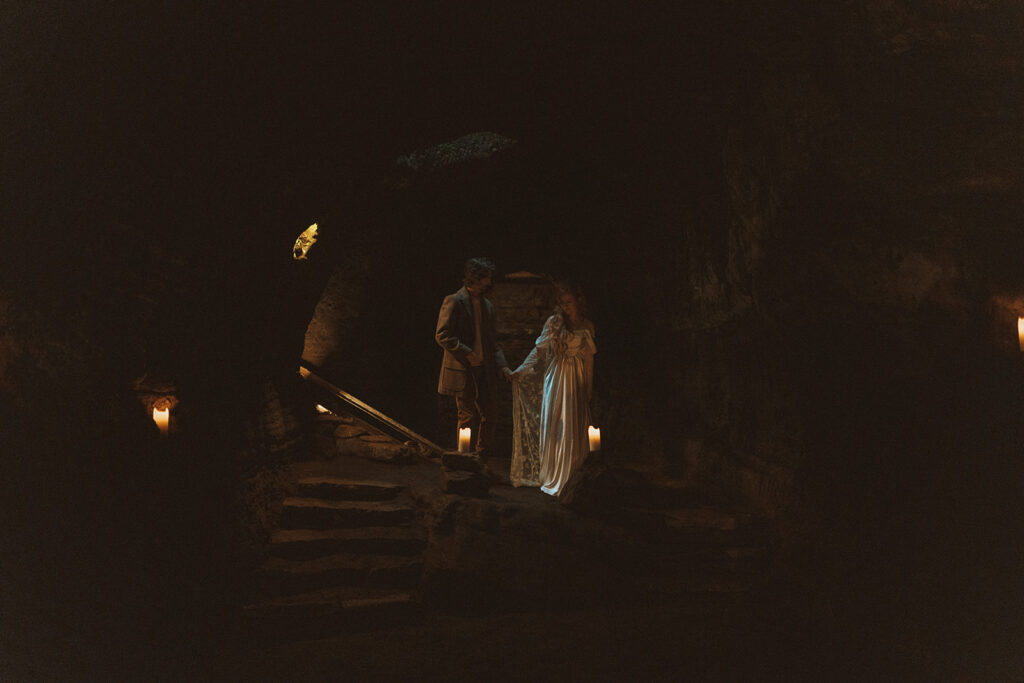 couple at the caves in hella iceland 