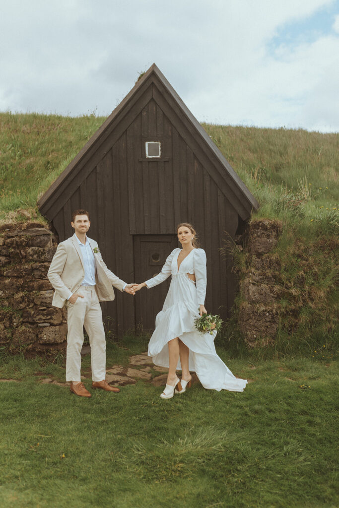 bride and groom looking at the camera during their photoshoot