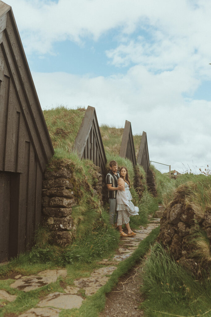 coupe hugging during their adventure photoshoot in iceland 