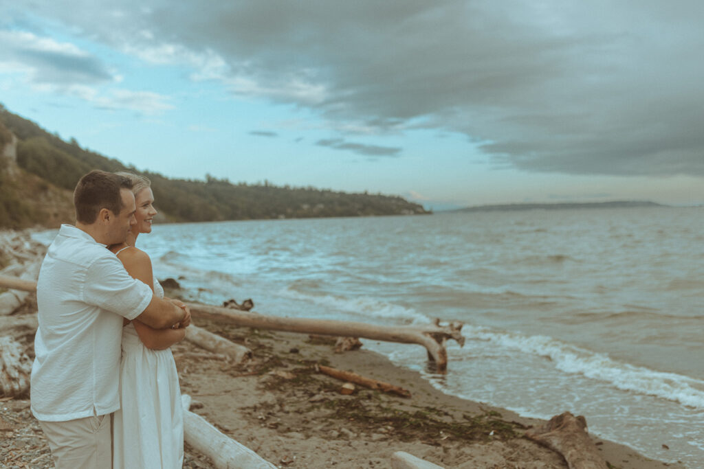 couple walking around the beach 