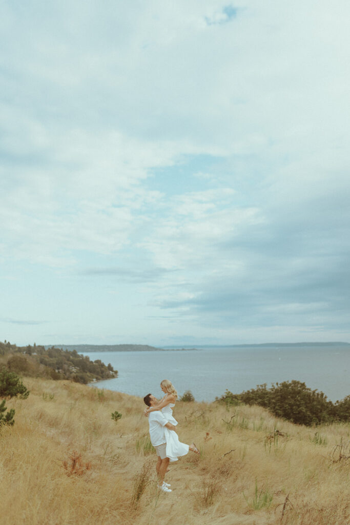 cute couple looking at each other during their playful engagement session