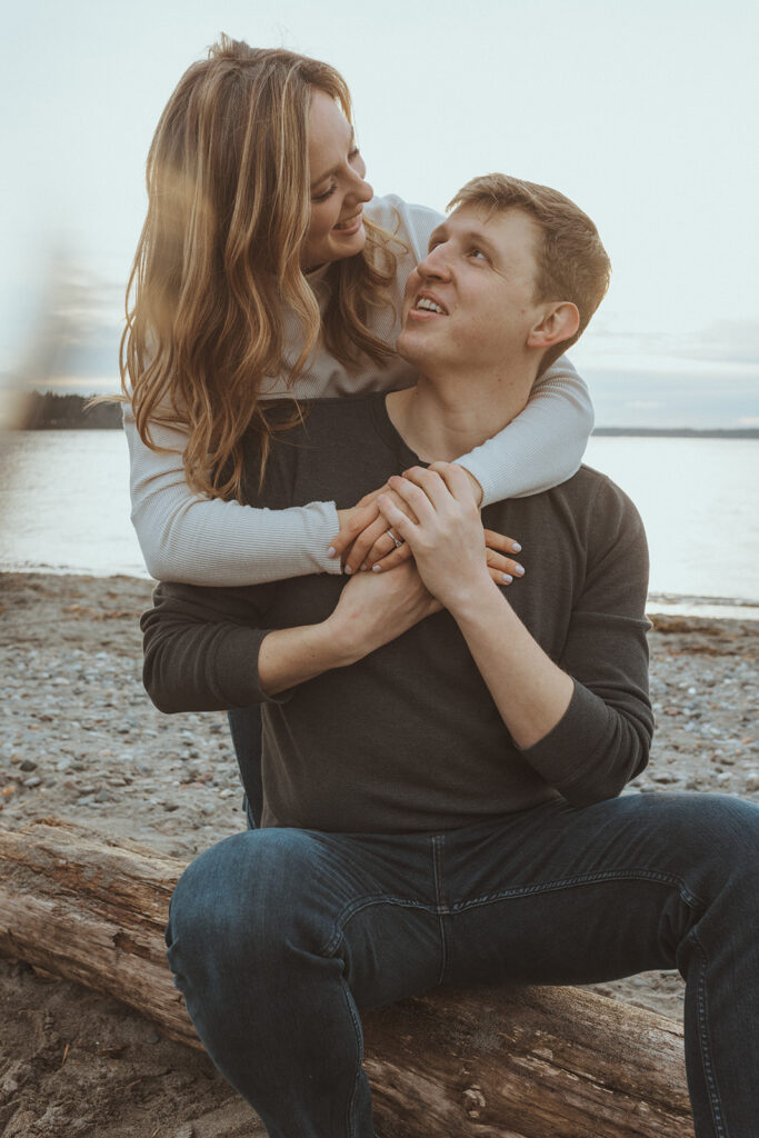 couple hugging and looking at each other during their engagement session