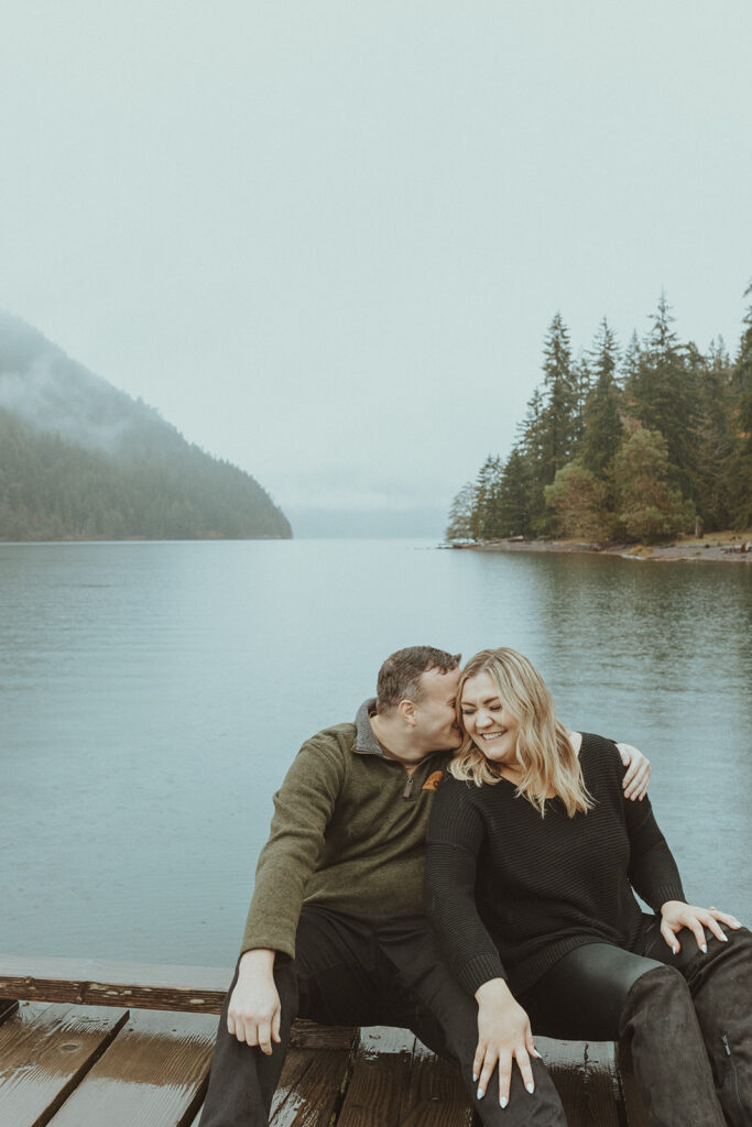 fiance kissing his fiance on the cheek