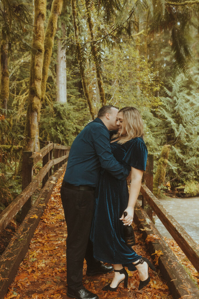 couple kissing during their photoshoot 