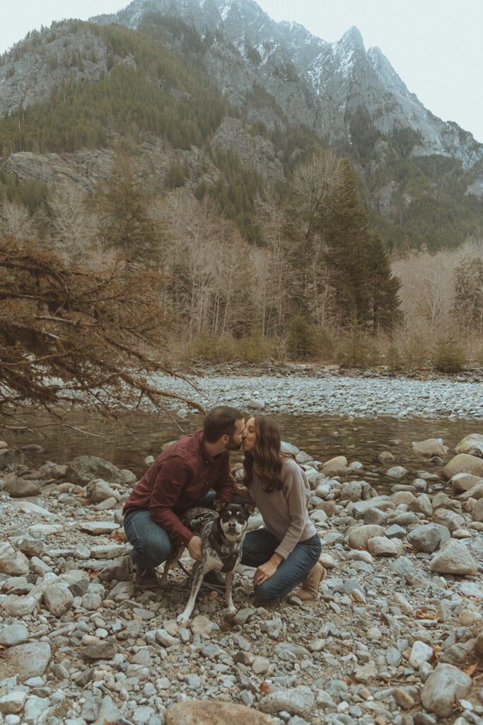 couple kissing during their photoshoot - Unique Engagement Session Ideas