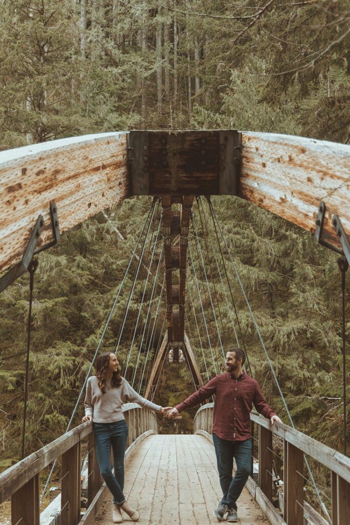 couple holding hands at their unique engagement session ideas