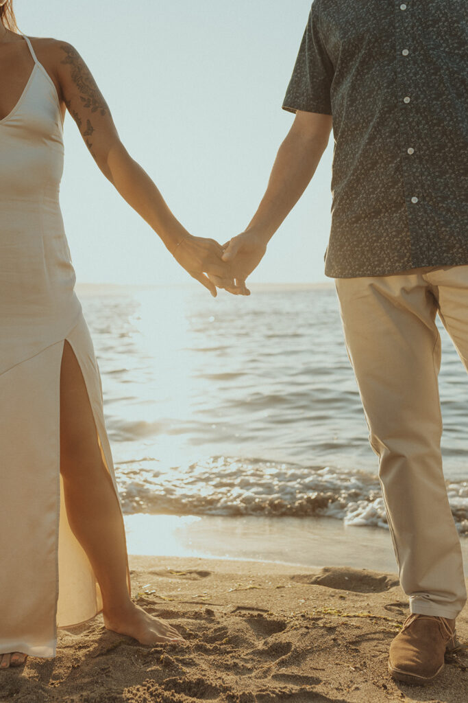 couple walking around the beach 