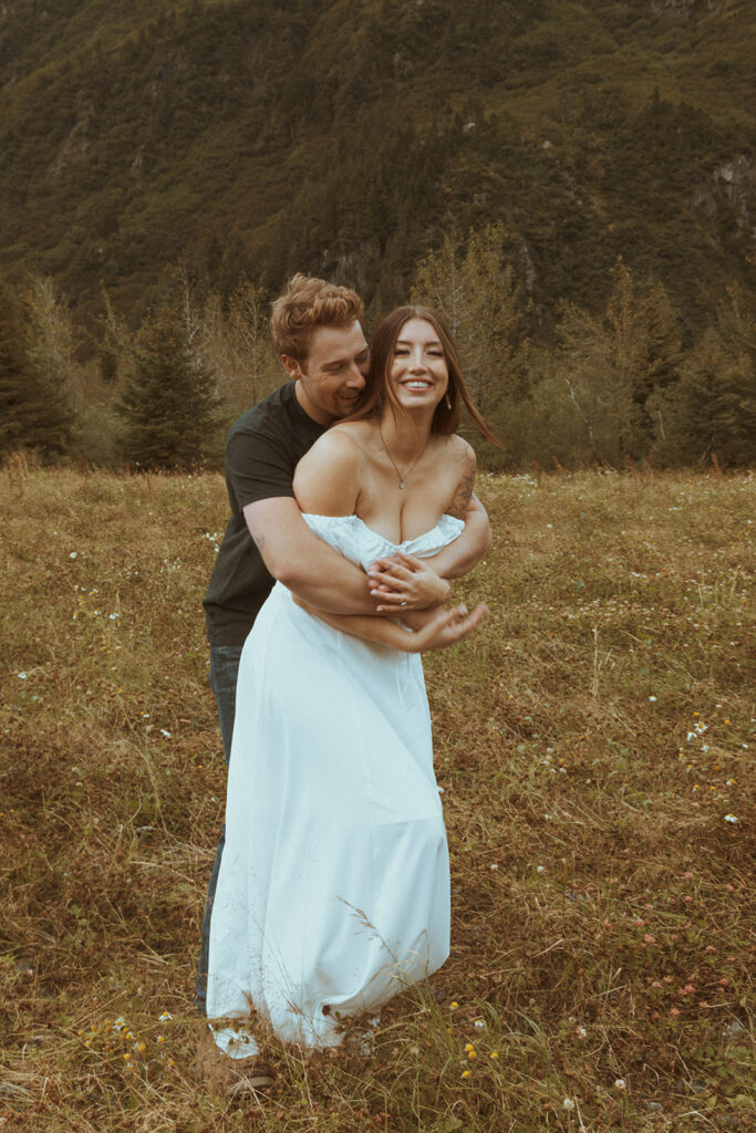 couple hugging during their engagement photoshoot