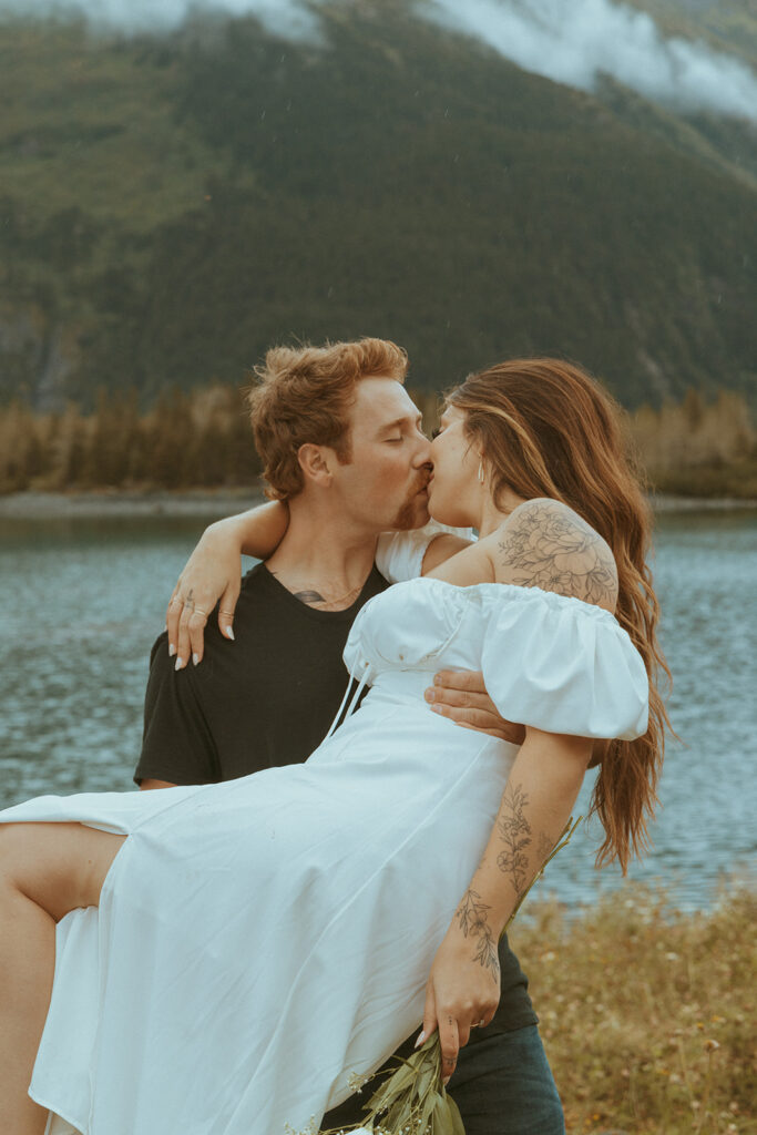 couple kissing during their engagement photoshoot