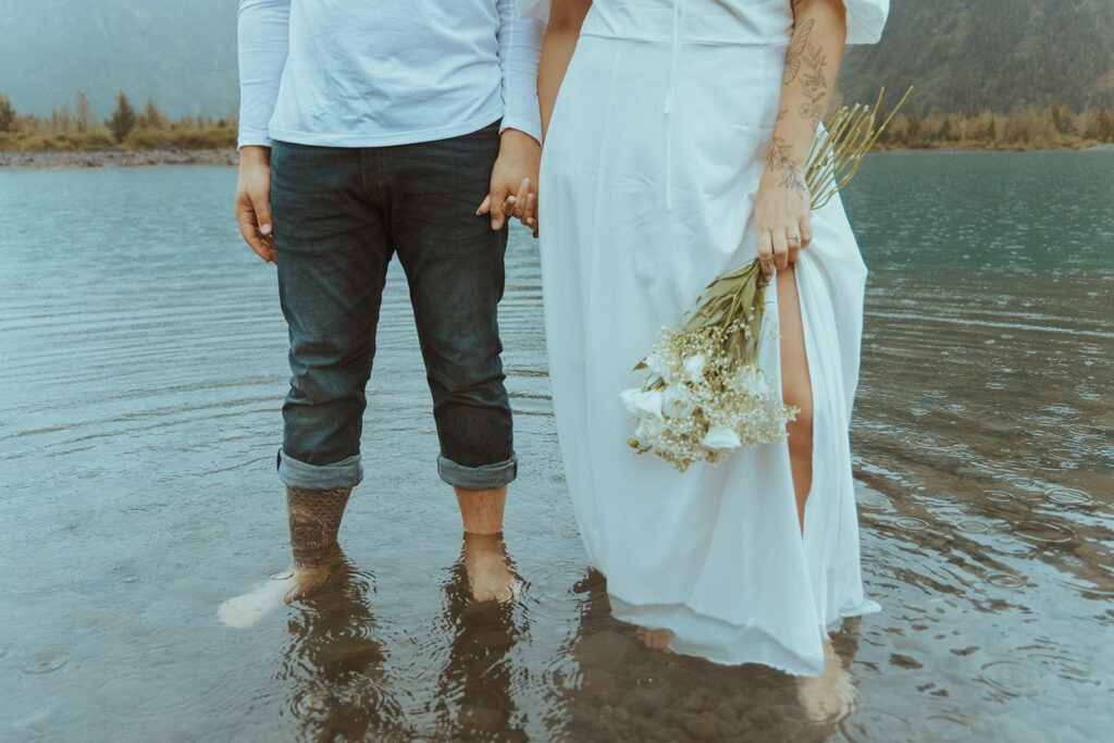 couple holding hands during their engagement photoshoot