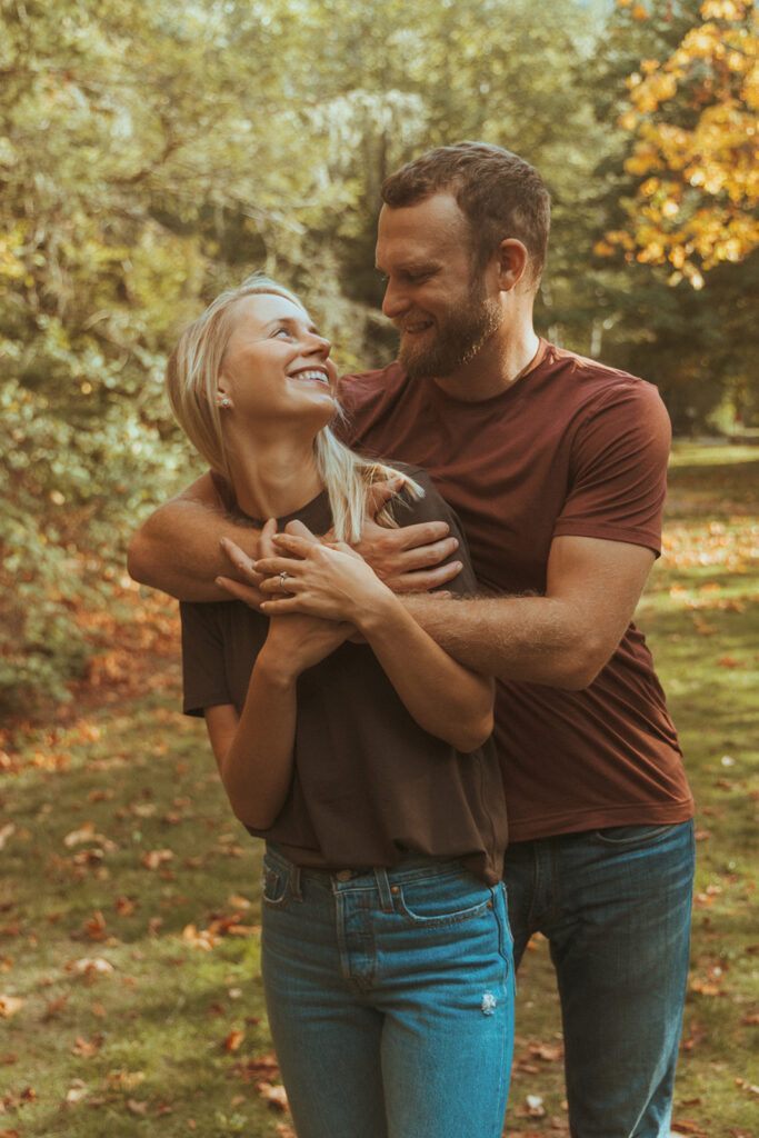 cute couple looking at each other during their photoshoot - locations for your engagement photos