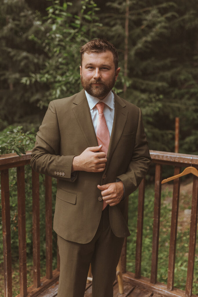 groom looking at the camera during his bridal portraits 