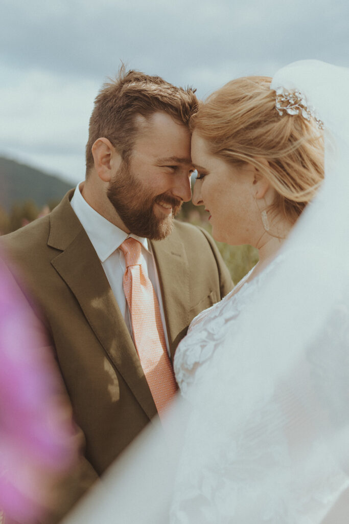 bride and groom looking at each other at creekbend cafe in alaska