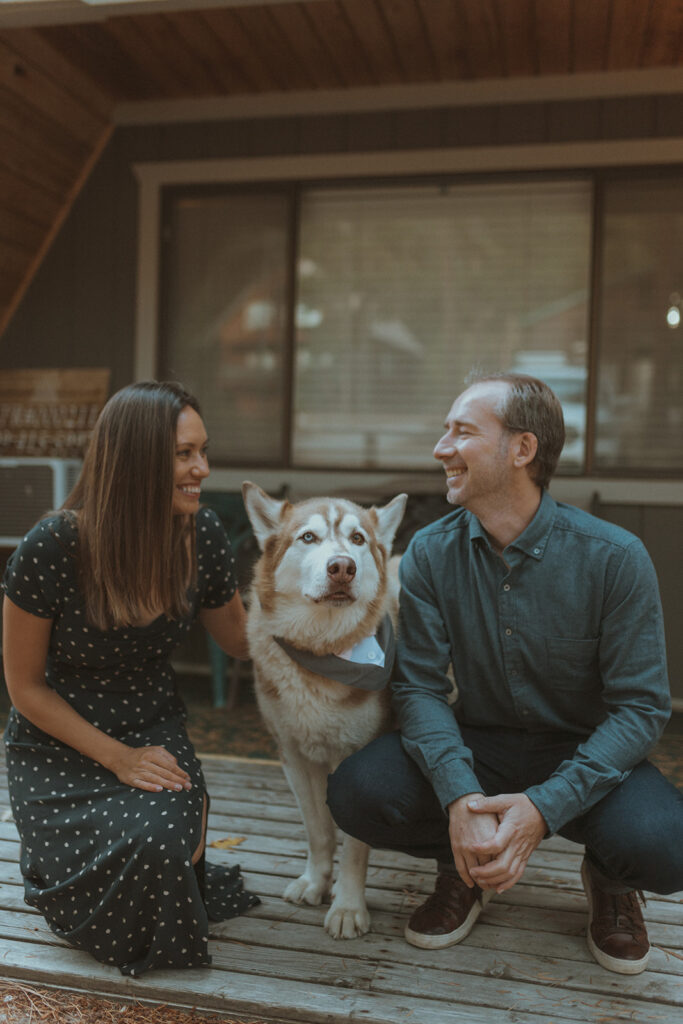 cute couple looking at each other during their engagement photoshoot 