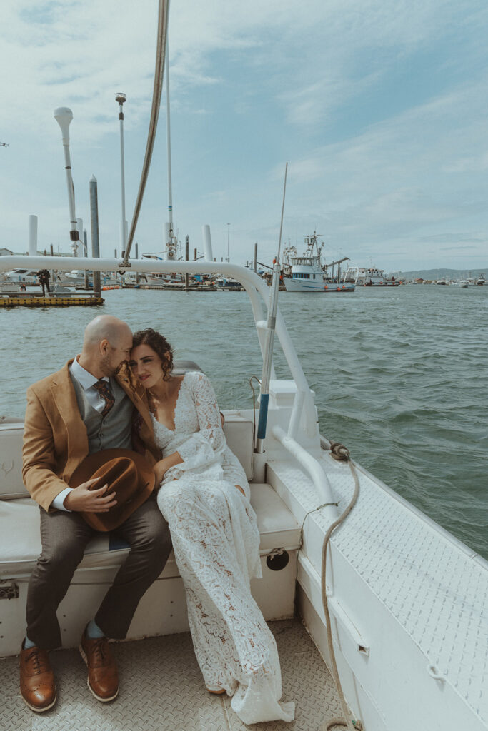 cute couple laughing at their wedding 