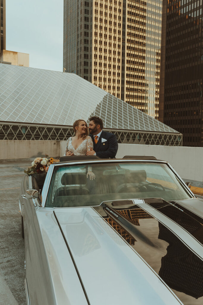 groom kissing the bride on the cheek - wedding send off ideas 