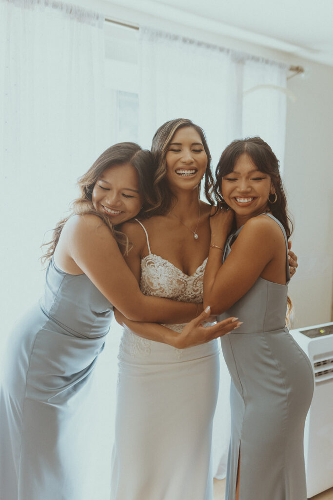 cute picture of the bride and her sisters