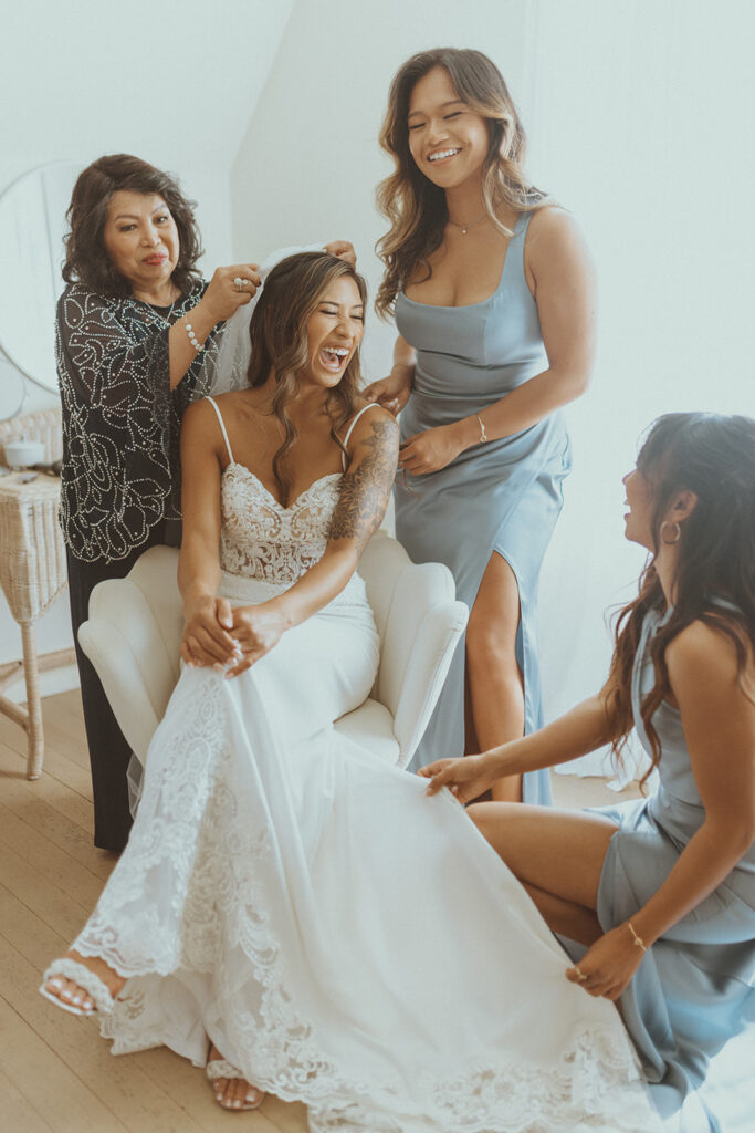 picture of the bride, her sisters and her mom