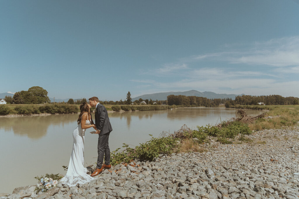 bride and groom kissing after reading their vows