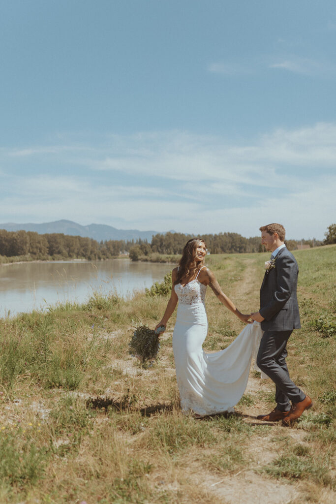 cute picture of the bride and groom holding hands