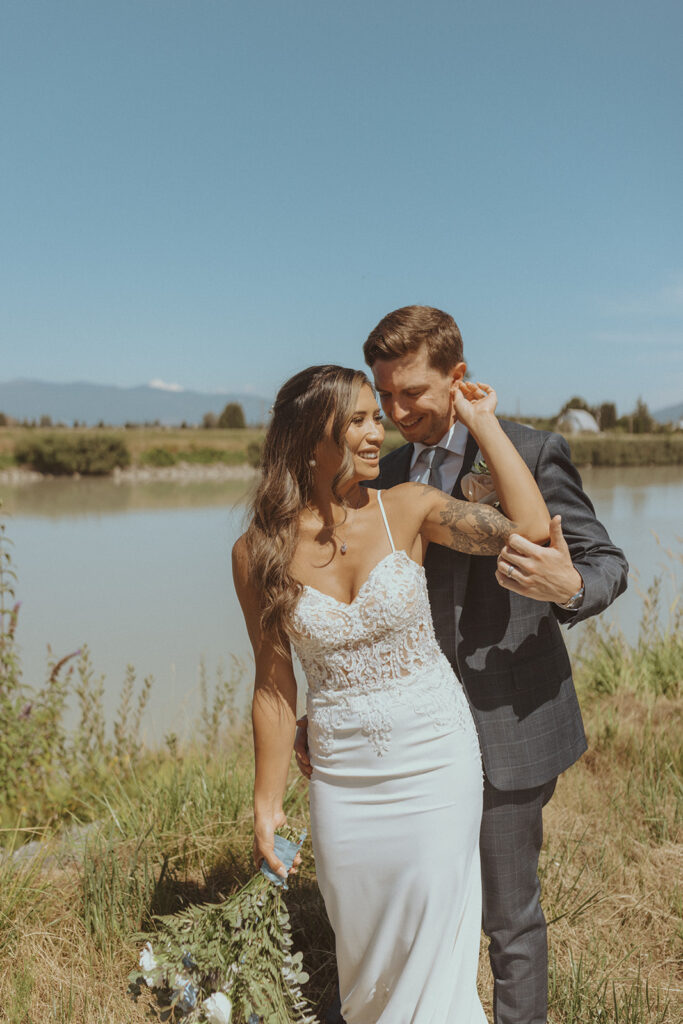 cute picture of the groom kissing the bride on the cheek