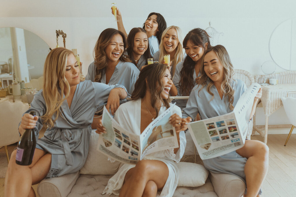 picture of the bride laughing with her friends before getting ready for the ceremony