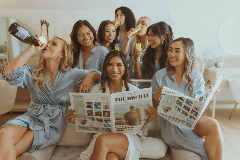 bride and her bridesmaids looking at the camera during their photoshoot