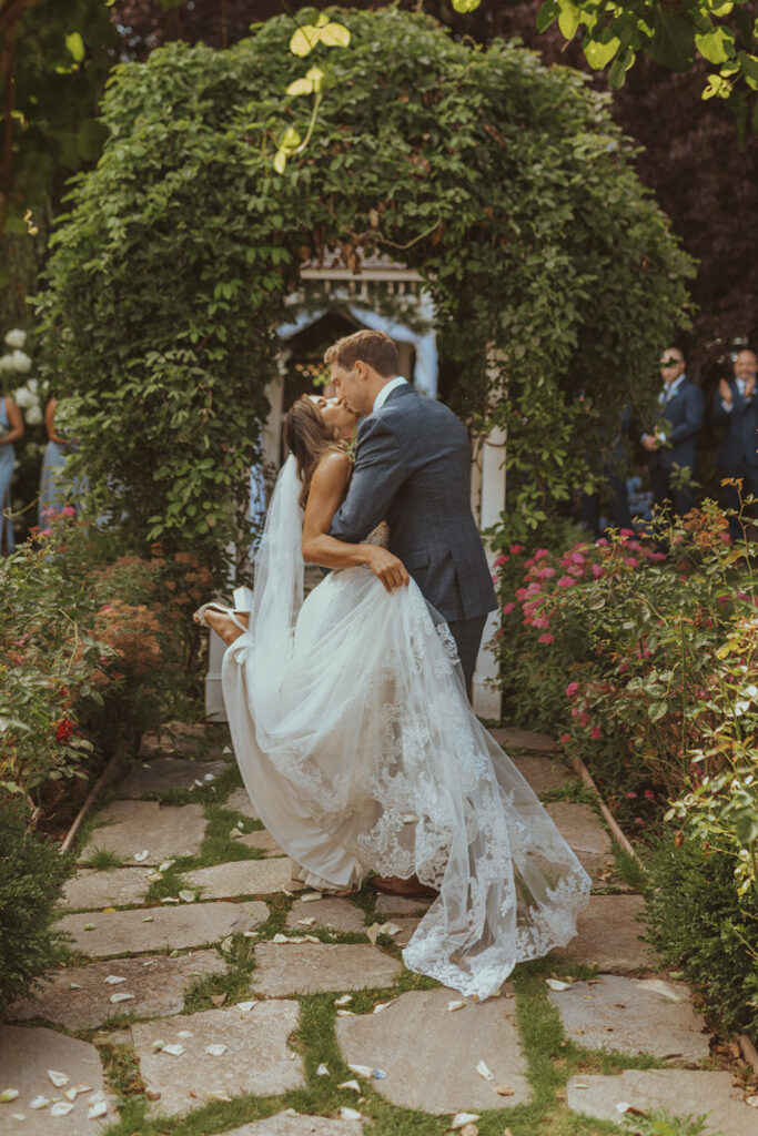 picture of the bride and groom kissing