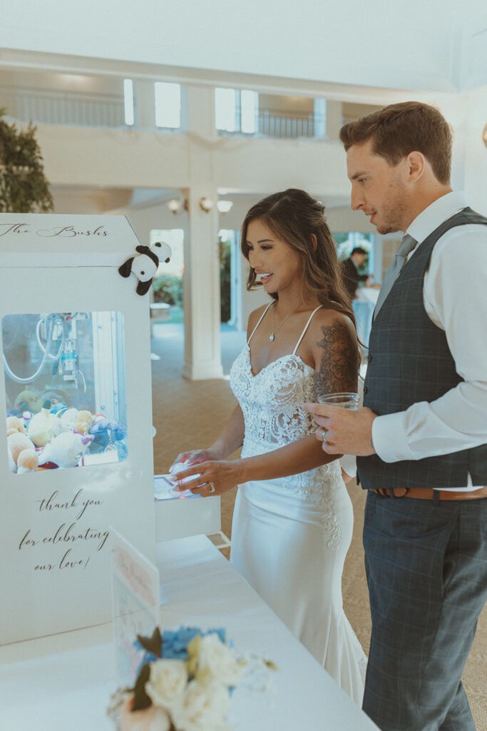 newlyweds plying at their wedding reception