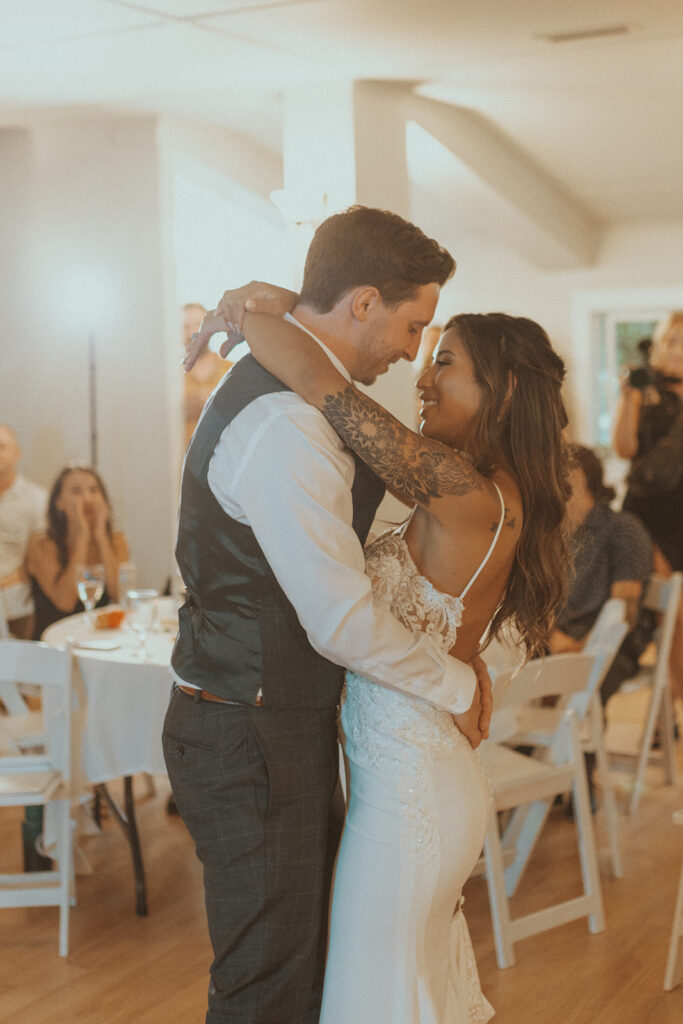 newlyweds first dance at the wedding reception