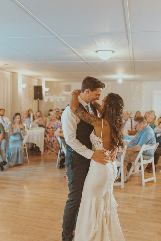 cute couple dancing at their wedding reception