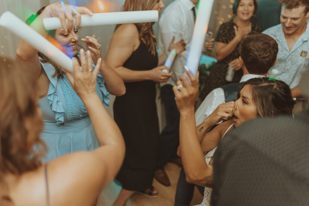 wedding guests dancing at the party