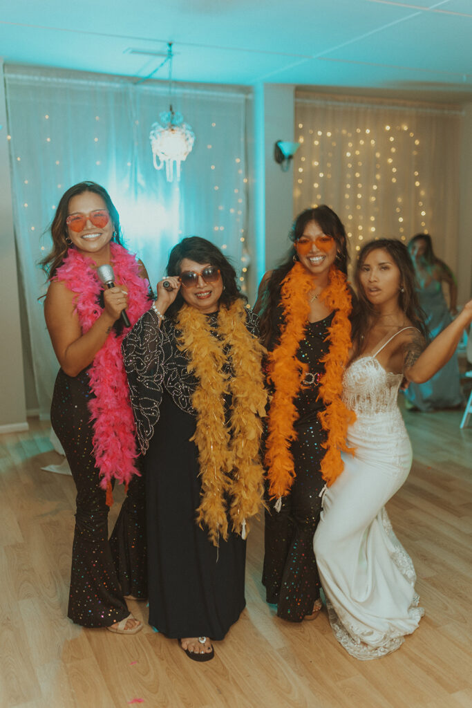 cute picture of the bride, her mom and her sisters