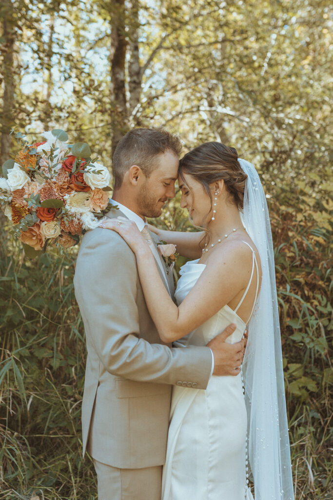 cute picture of the bride and groom looking at each other at their dream backyard wedding